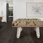 Foosball table in a modern kitchen with a map on the wall