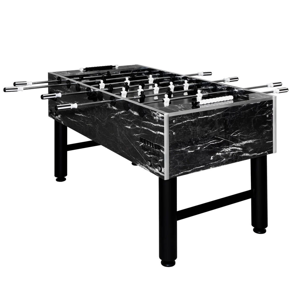 Foosball table with marble-like finish on a white background