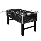 Foosball table with marble-like finish on a white background