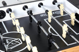 Players on a Atomic Pro Force Foosball Table by DMI Sports available at Foosball Planet.